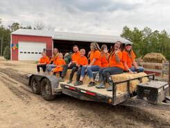 Picture of volunteers on a hay ride
